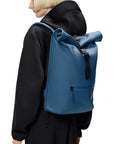 Rains Rolltop Rucksack in Pulse