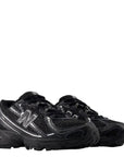 New Balance Youth 740 in Black with Silver Metallic