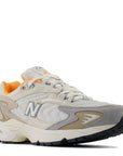 New Balance Women's 725 in Sea Salt with Hot mango and Timber Wolf