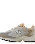 New Balance Women's 725 in Sea Salt with Hot mango and Timber Wolf