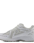 New Balance Women's 1906R in White with Team Royal and Silver Metallic